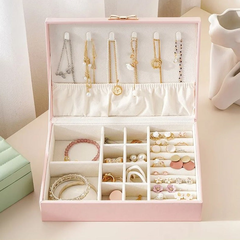 Boîte à bijoux nœud coquette en cuir