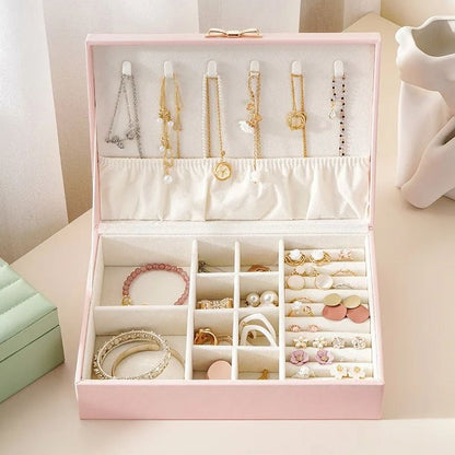 Boîte à bijoux nœud coquette en cuir