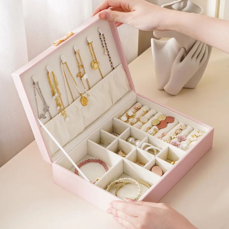 Boîte à bijoux nœud coquette en cuir