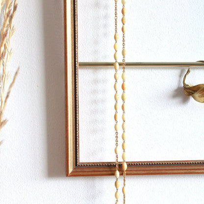 Cadre porte-bijoux mural vintage doré en bois