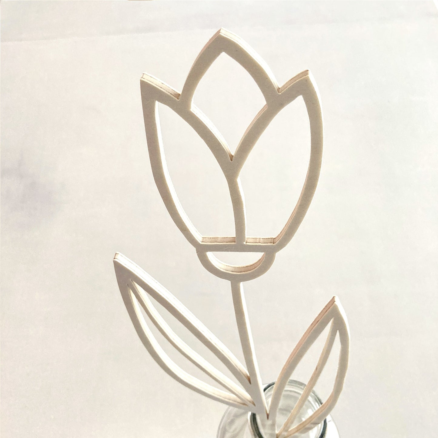 Fleur à bijoux en bois