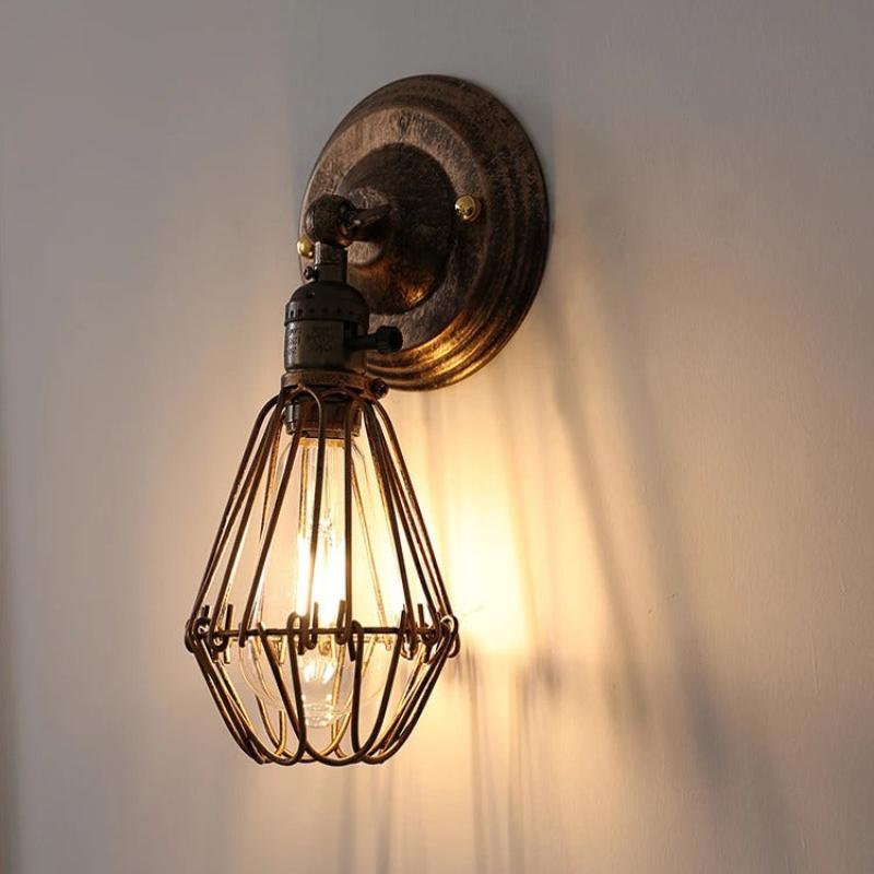 applique murale cage oiseau bronze