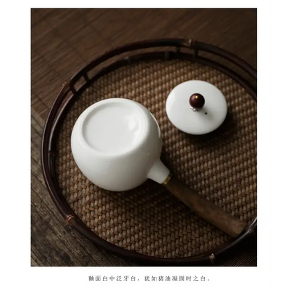 Théière en porcelaine avec filtre