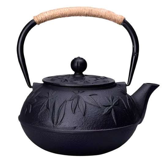 Théière japonaise en fonte gravée de feuilles